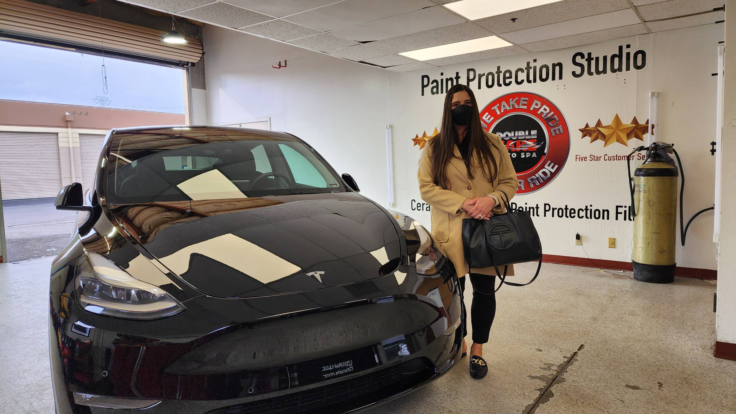 Tesla Black wih Customer